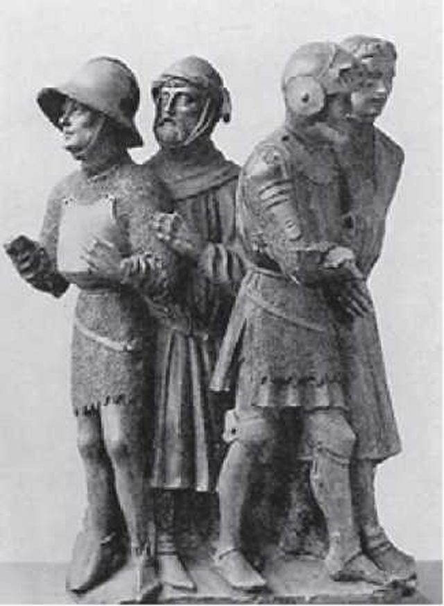 Скульптурное изображение воинов в сцене несения Креста